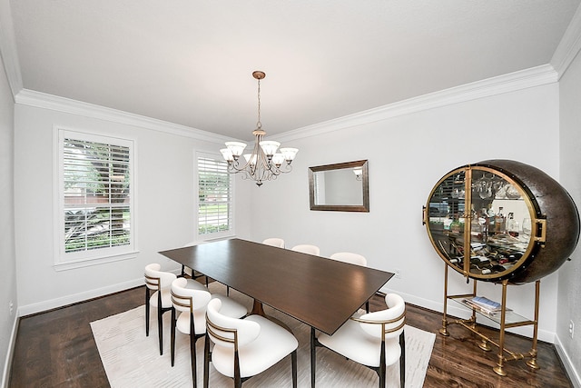 dining area featuring a chandelier, crown molding, dark wood finished floors, and baseboards