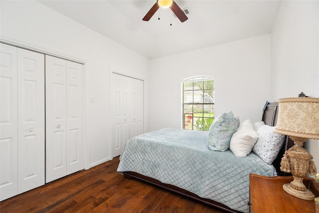 12915 Lake Mist Dr, Cypress, TX 77429 - bedroom with wood finished floors, two closets, and ceiling fan