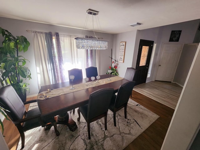18534 Wolf Creek Trl, Humble, TX 77346 - dining room with wood finished floors and baseboards