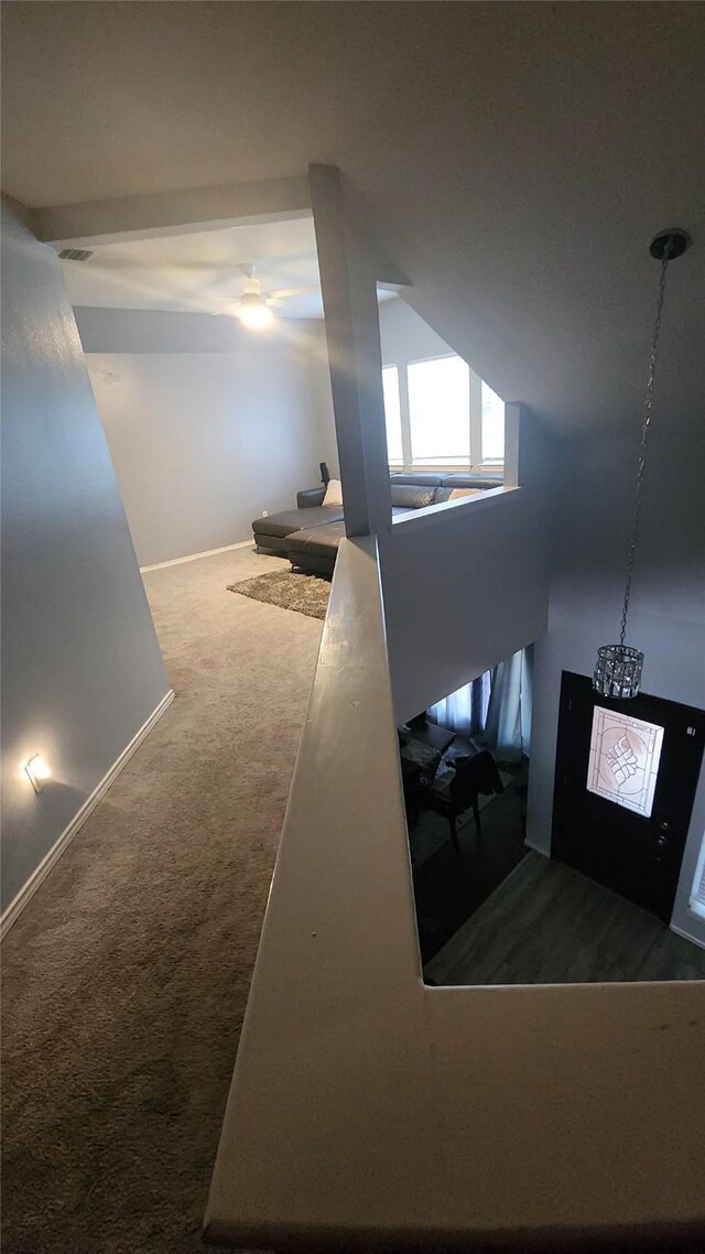 18534 Wolf Creek Trl, Humble, TX 77346 - stairway featuring carpet flooring and baseboards