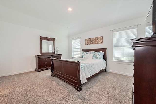 31707 Whittis Hill Way, Fulshear, TX 77441 - bedroom featuring baseboards, light colored carpet, multiple windows, and lofted ceiling