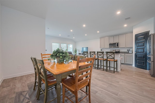 31707 Whittis Hill Way, Fulshear, TX 77441 - dining room featuring light wood finished floors, recessed lighting, and baseboards