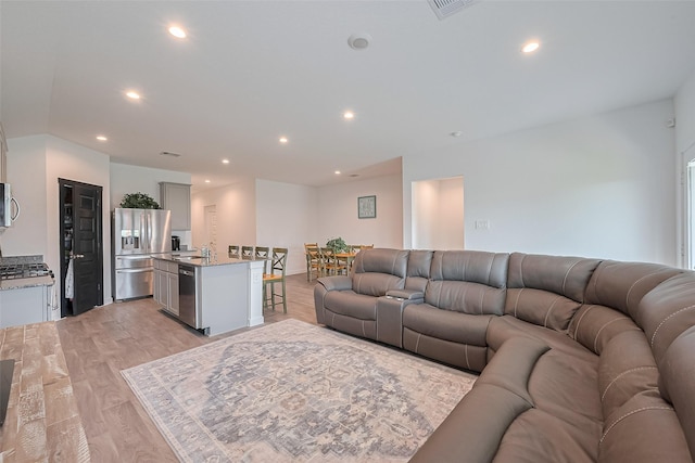 31707 Whittis Hill Way, Fulshear, TX 77441 - living area with light wood finished floors and recessed lighting