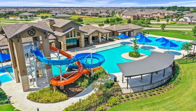 31707 Whittis Hill Way, Fulshear, TX 77441 - community pool with a residential view, a water slide, and a patio
