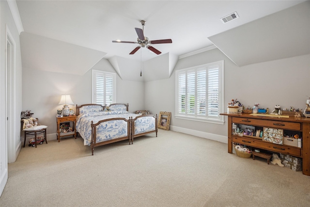 carpeted bedroom featuring vaulted ceiling, baseboards, and a ceiling fan