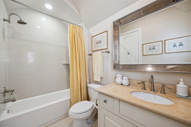 full bathroom with toilet, shower / bath combination with curtain, and vanity