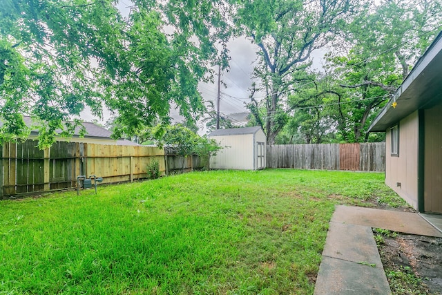 view of yard with a shed and an outdoor structure