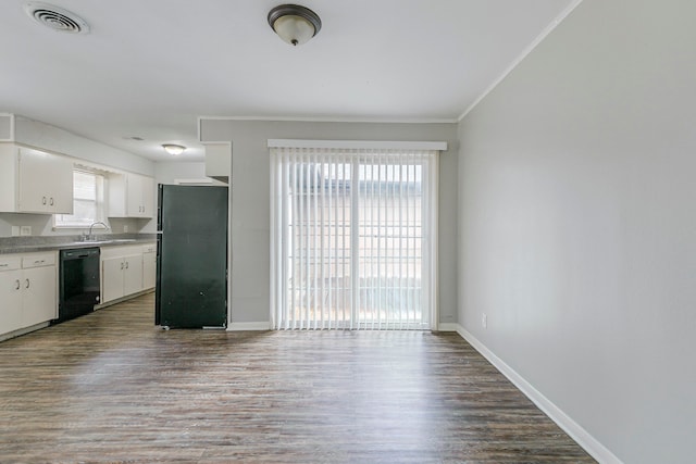 kitchen featuring black appliances, dark wood-style flooring, white cabinets, baseboards, and ornamental molding