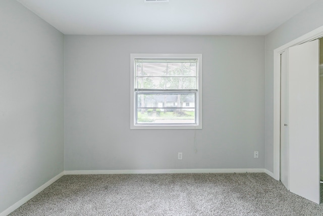 7150 Edgemoor Dr, Houston, TX 77074 - unfurnished bedroom featuring carpet flooring, baseboards, and a closet