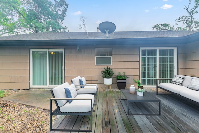 7150 Edgemoor Dr, Houston, TX 77074 - rear view of house with roof with shingles, an outdoor hangout area, a deck, and a patio