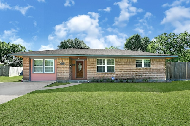 ranch-style home featuring brick siding