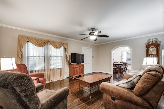 111 S Roosevelt Ave, Cleveland, TX 77327 - living room with arched walkways, dark wood-type flooring, a ceiling fan, crown molding, and baseboards