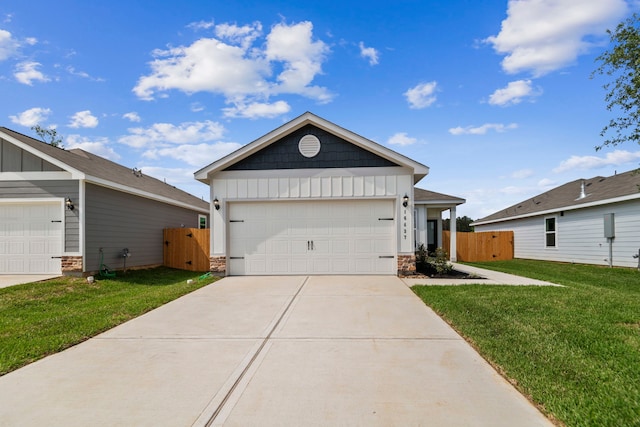 16437 Blossom Grove Dr, Conroe, TX 77303 - ranch-style house featuring board and batten siding, stone siding, and a gate
