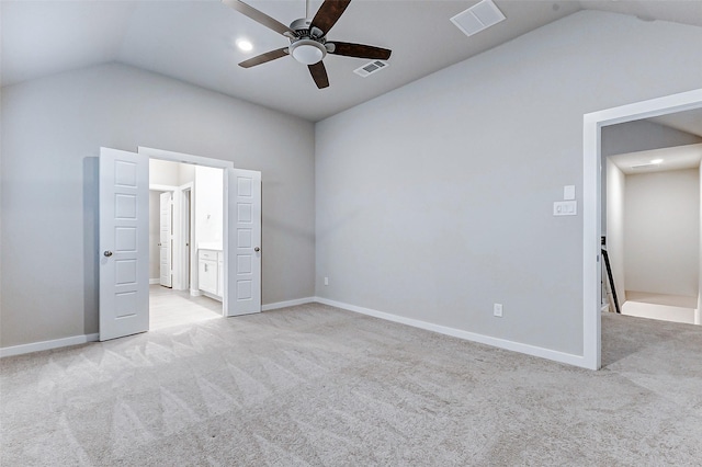 8119 Blue Fish Dr, Cypress, TX 77433 - unfurnished bedroom with lofted ceiling, light colored carpet, baseboards, connected bathroom, and ceiling fan