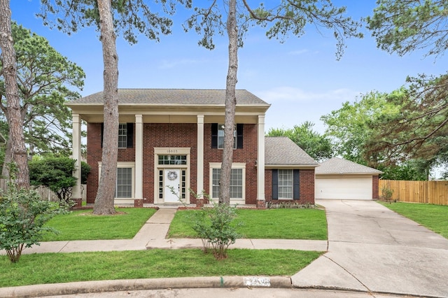 16603 April Hill St, Houston, TX 77095 - greek revival inspired property featuring brick siding and a shingled roof