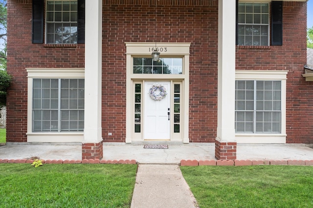 16603 April Hill St, Houston, TX 77095 - property entrance with brick siding and a porch