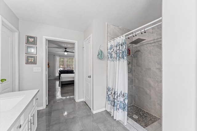 16603 April Hill St, Houston, TX 77095 - bathroom featuring tiled shower, connected bathroom, a ceiling fan, and vanity