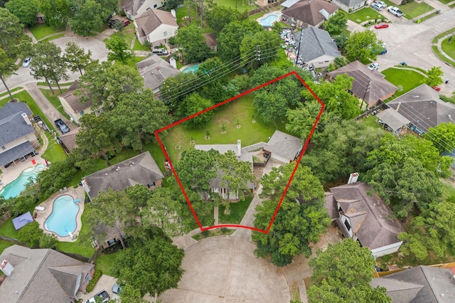 16603 April Hill St, Houston, TX 77095 - aerial perspective of suburban area with a pool area and property parcel outlined