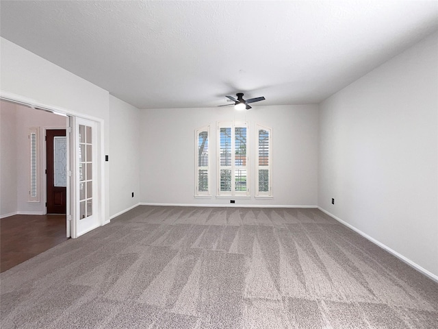 3306 Cactus Heights Ln, Pearland, TX 77581 - unfurnished room featuring carpet floors, a ceiling fan, and baseboards