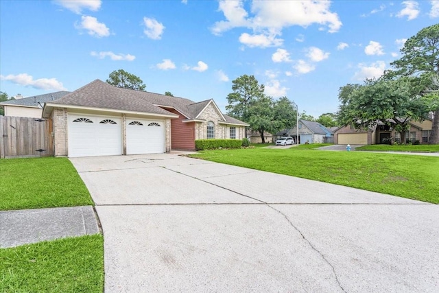 9302 Kirkchapel Ct, Spring, TX 77379 - view of front of home with a garage, concrete driveway, and brick siding