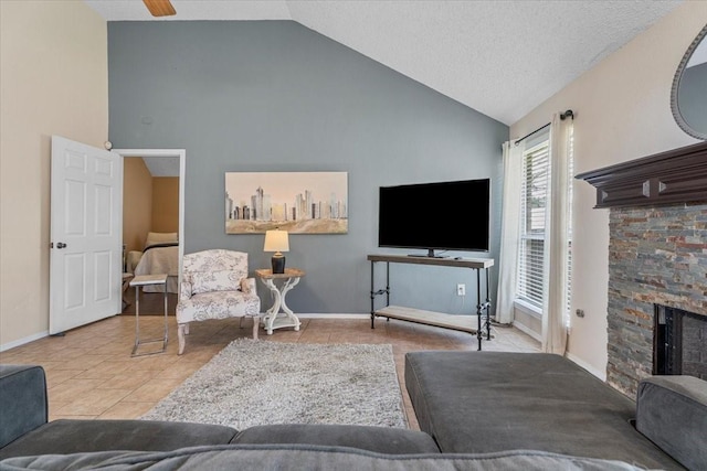 9302 Kirkchapel Ct, Spring, TX 77379 - living area featuring tile patterned floors, high vaulted ceiling, a fireplace, and baseboards