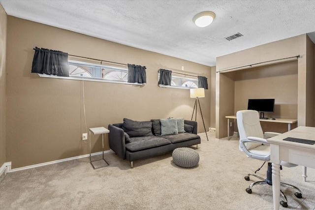 9302 Kirkchapel Ct, Spring, TX 77379 - office featuring carpet floors, baseboards, and a textured ceiling