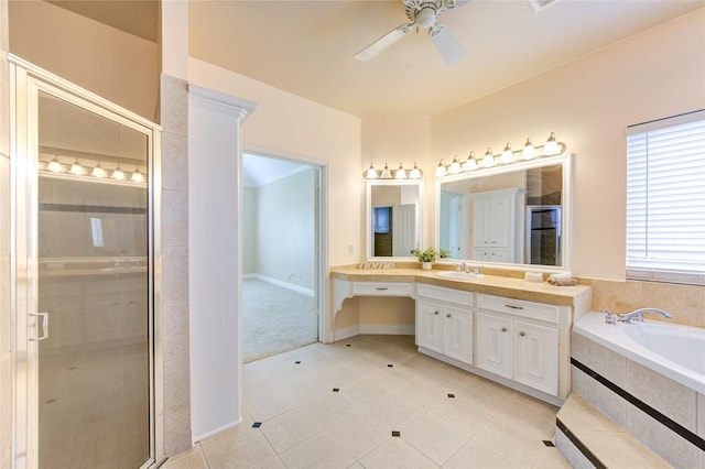 2007 N Greens Blvd, Richmond, TX 77406 - bathroom with a stall shower, a ceiling fan, vanity, tile patterned flooring, and a garden tub