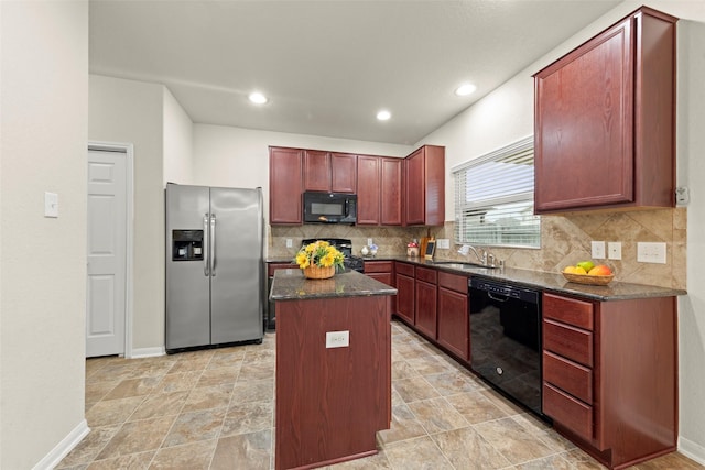 15010 Calico Heights Ln, Cypress, TX 77433 - kitchen with black appliances, a sink, dark brown cabinets, a kitchen island, and decorative backsplash