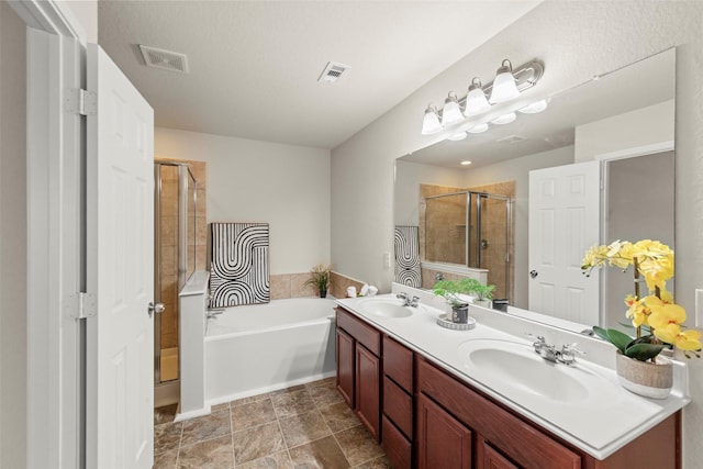 15010 Calico Heights Ln, Cypress, TX 77433 - bathroom featuring a stall shower, a garden tub, and double vanity
