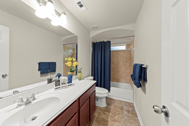 15010 Calico Heights Ln, Cypress, TX 77433 - bathroom featuring baseboards, vanity, toilet, shower / bath combination with curtain, and stone finish floors