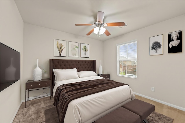 15010 Calico Heights Ln, Cypress, TX 77433 - bedroom with baseboards and a ceiling fan