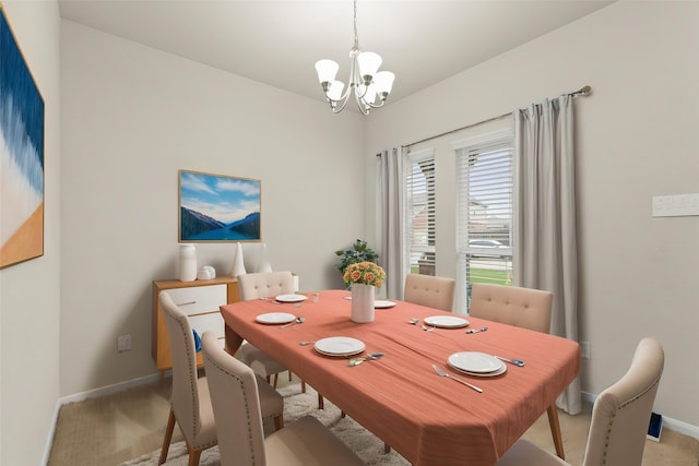 15010 Calico Heights Ln, Cypress, TX 77433 - dining space with a chandelier, light colored carpet, and baseboards
