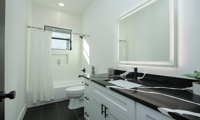 1224 Johnston St, Houston, TX 77022 - full bath with vanity, tile patterned floors, toilet, and shower / bath combo with shower curtain