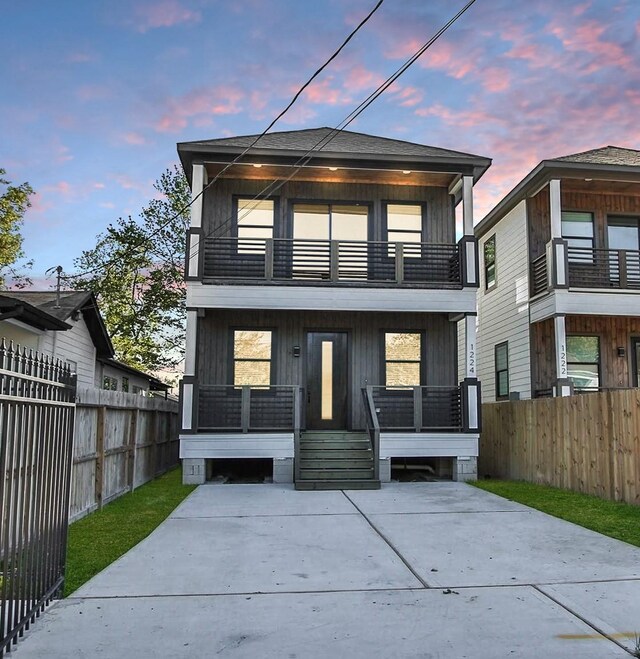 1224 Johnston St, Houston, TX 77022 - view of front of house with a balcony and a porch