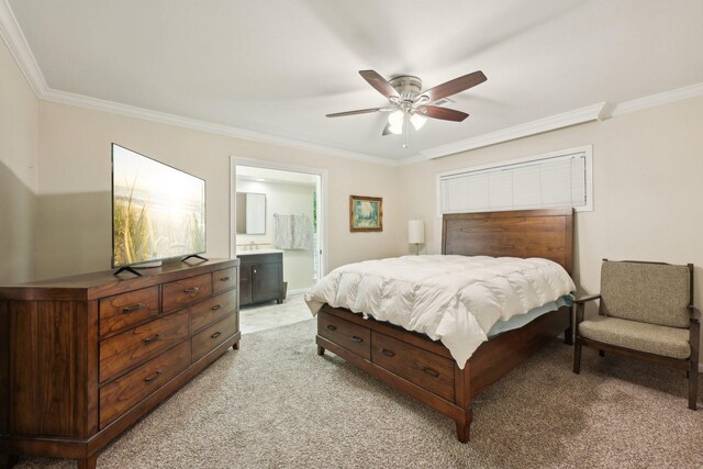 1410 Saxony Ln, Nassau Bay, TX 77058 - bedroom featuring ornamental molding, light colored carpet, a ceiling fan, and ensuite bathroom