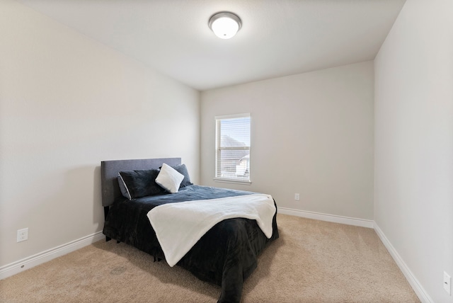 27935 Chiapas Dr, Spring, TX 77386 - bedroom featuring light carpet and baseboards