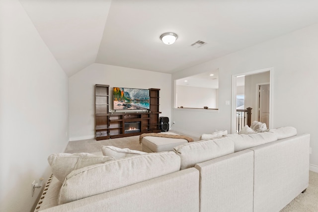 27935 Chiapas Dr, Spring, TX 77386 - living room featuring light colored carpet, baseboards, and vaulted ceiling