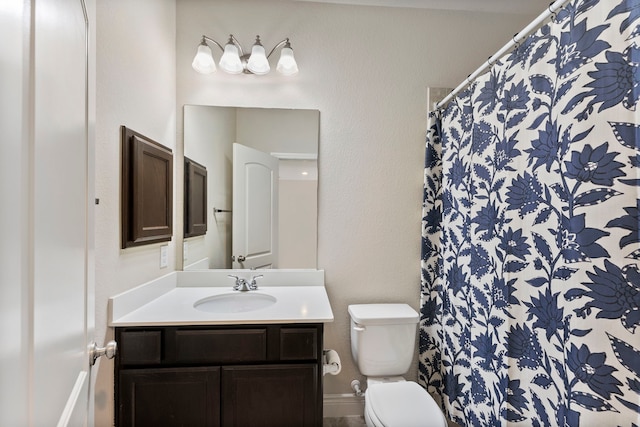 27935 Chiapas Dr, Spring, TX 77386 - bathroom with toilet, vanity, and a shower with shower curtain