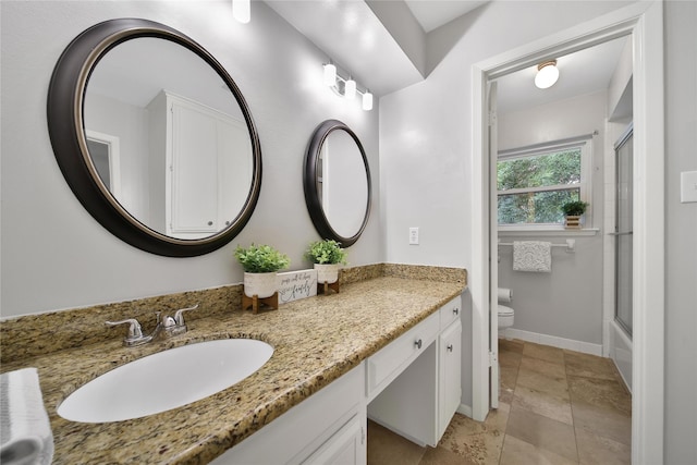 12443 Honeywood Trl, Houston, TX 77077 - full bathroom with toilet, vanity, and baseboards