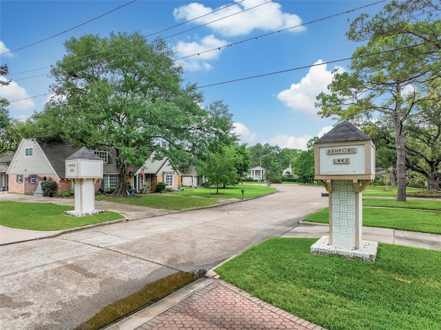 12443 Honeywood Trl, Houston, TX 77077 - view of concrete road featuring curbs