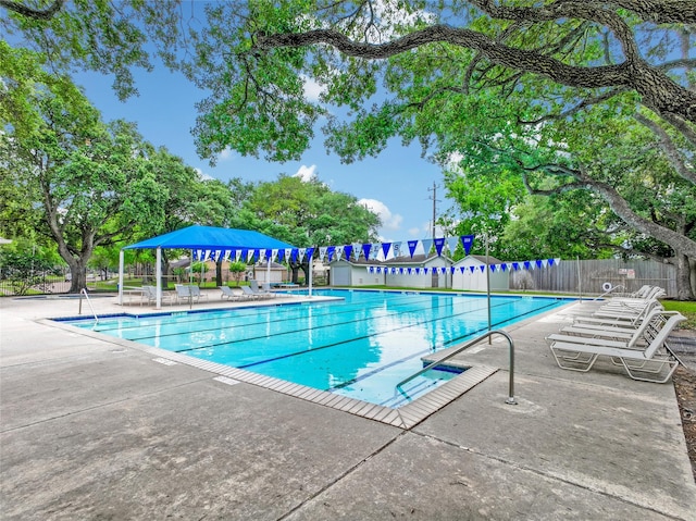 12443 Honeywood Trl, Houston, TX 77077 - community pool with fence and a patio area
