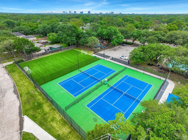 12443 Honeywood Trl, Houston, TX 77077 - view of tennis court featuring a view of skyline