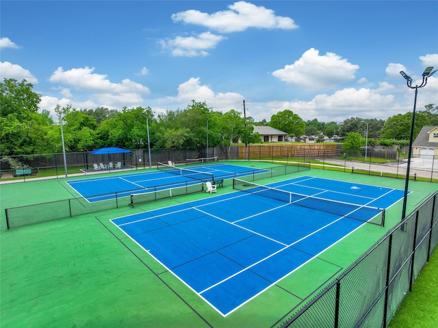 12443 Honeywood Trl, Houston, TX 77077 - view of tennis court featuring fence and community basketball court