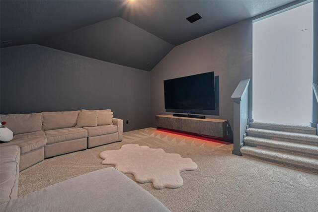 29851 Aaron River Trl, Fulshear, TX 77441 - living area featuring lofted ceiling, carpet floors, and stairway