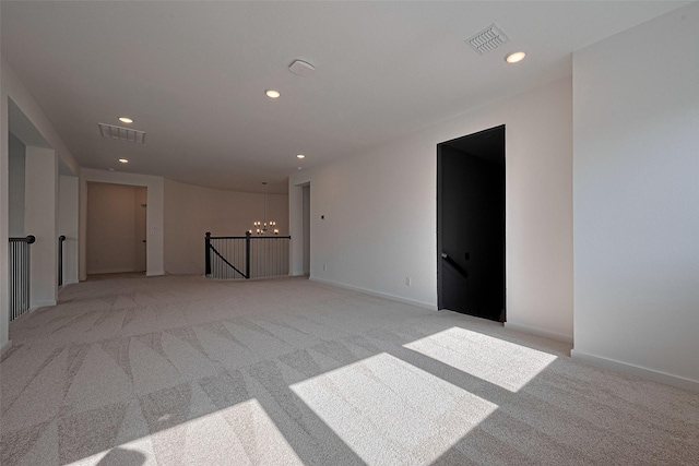 29851 Aaron River Trl, Fulshear, TX 77441 - spare room featuring a chandelier, recessed lighting, light colored carpet, and baseboards
