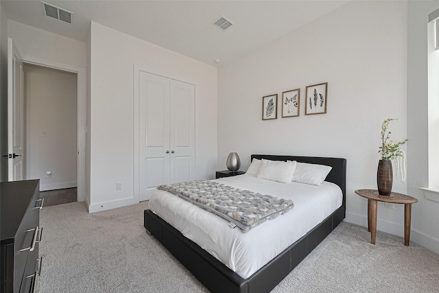 29851 Aaron River Trl, Fulshear, TX 77441 - bedroom with light carpet, a closet, and baseboards