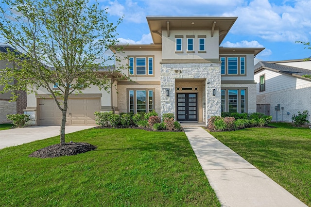 29851 Aaron River Trl, Fulshear, TX 77441 - view of front of home with stucco siding, stone siding, french doors, and a front lawn