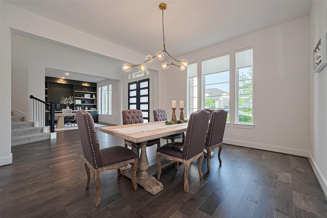 29851 Aaron River Trl, Fulshear, TX 77441 - dining space with stairs, baseboards, dark wood-style flooring, and a chandelier