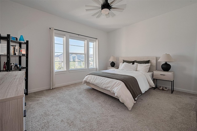 29851 Aaron River Trl, Fulshear, TX 77441 - bedroom featuring light colored carpet, baseboards, and a ceiling fan