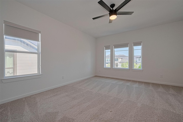 29851 Aaron River Trl, Fulshear, TX 77441 - unfurnished room with baseboards, light colored carpet, and ceiling fan